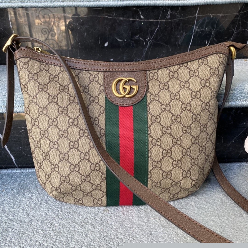 G*u*i top handle bags
